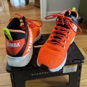 Zumba Fitness Orange and Black Athletic Shoes with Vibrant Design